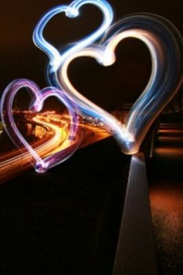 Rastros de Luz en Forma de Corazón