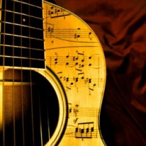 Guitarra con Notas Musicales
