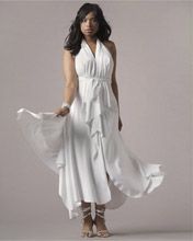 Mujer Elegante en Vestido Blanco