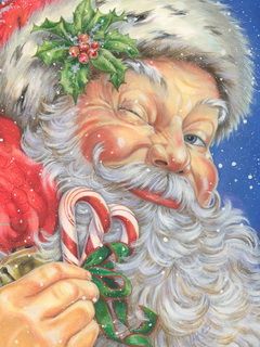Santa Claus con bastones de caramelo
