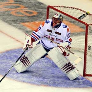 Portero de Hockey sobre Hielo en Acción