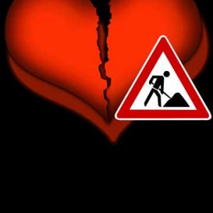 Corazón Roto con Señal de Advertencia
