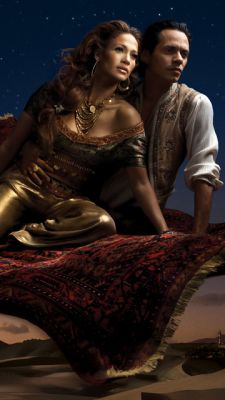 Pareja Fantástica en una Alfombra Mágica