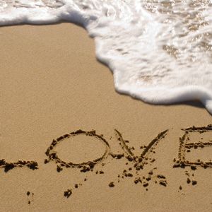 Amor Escrito en la Arena