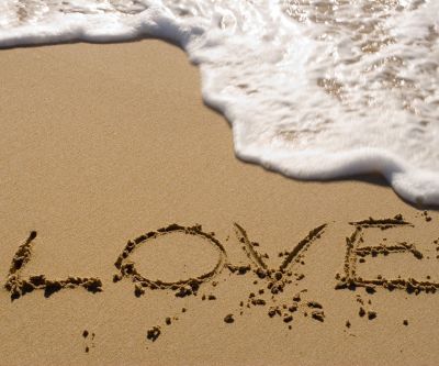 Amor Escrito en la Arena