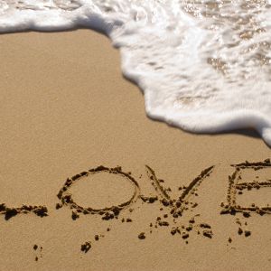 Amor Escrito en la Arena