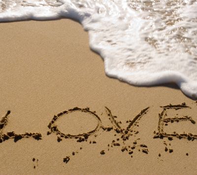 Amor Escrito en la Arena