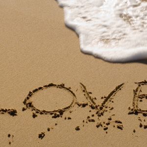Amor Escrito en la Arena