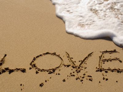 Amor Escrito en la Arena