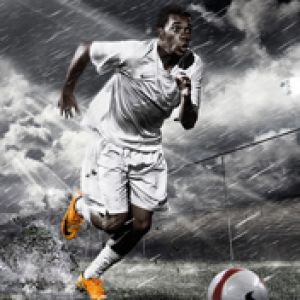 Jugador de Fútbol Dinámico en Acción