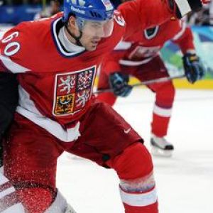Foto de Acción Jugador de Hockey Checo