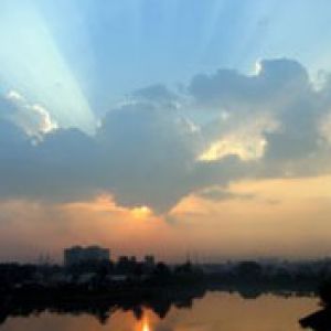 Reflejo del Atardecer en el Agua