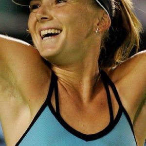 Jugadora de Tenis Sonriente