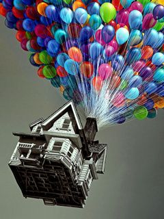 Casa con globos coloridos