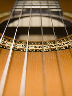Acercamiento de Guitarra Acústica