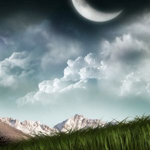 Paisaje Montañoso Iluminado por la Luna