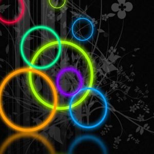 Círculos Neón Coloridos sobre Negro