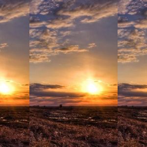 Impresionante atardecer sobre campos