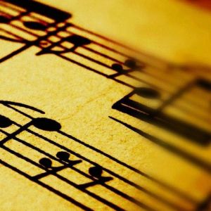 Notas Musicales en Partitura