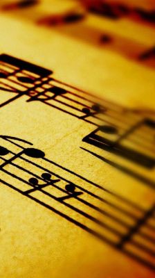 Notas Musicales en Partitura