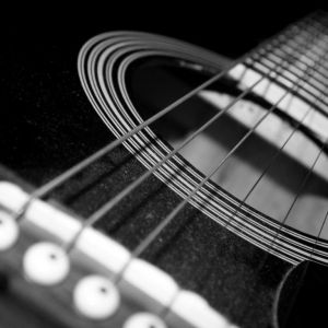 Acercamiento de Guitarra Acústica