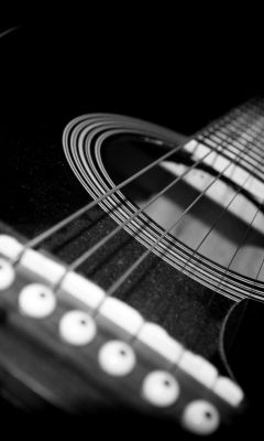Acercamiento de Guitarra Acústica